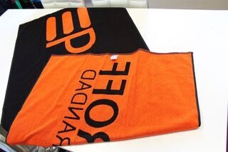 Towels with woven logo
